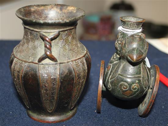 A Chinese small bronze phoenix vase and an archaistic bronze vase, 17th / 18th century, 8.8 and 9.5cm (2)